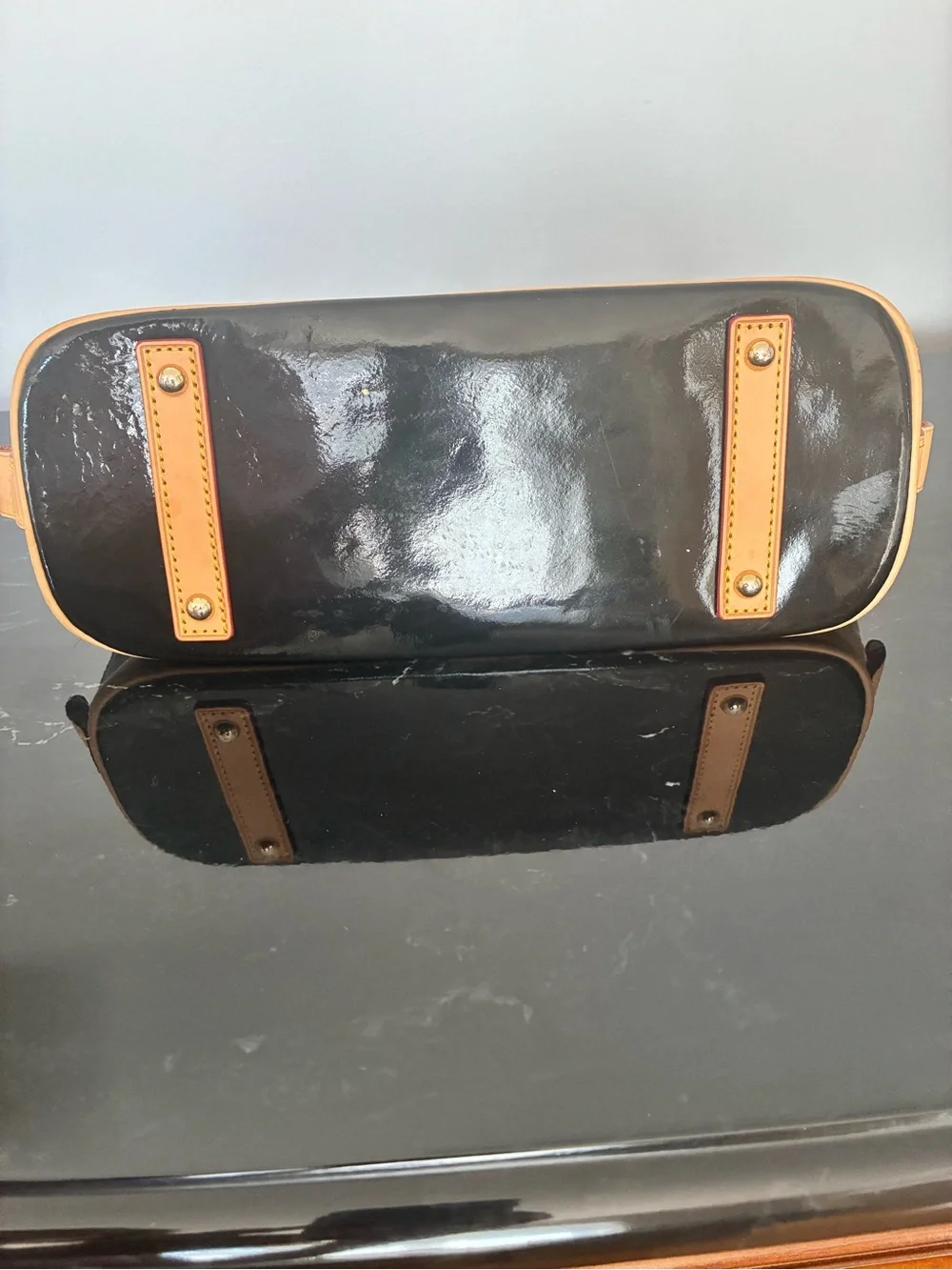 Dooney & Bourke Black Patent Leather Satchel with Tan Trim and Red-Accent Strap